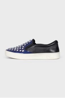 Blue leather slip-ons with decor