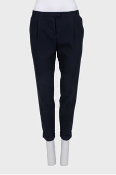Black trousers with roll-ups