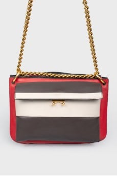 Bag on a golden metal chain