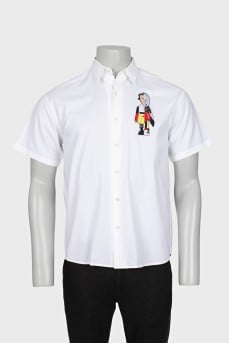 Men's shirt decorated with patches