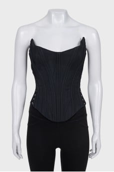 Fitted corset with lacing and hooks