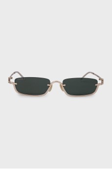 Rectangular sunglasses with green tint