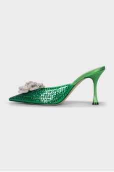 Green mules decorated with rhinestones