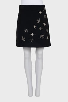 Straight skirt decorated with beads