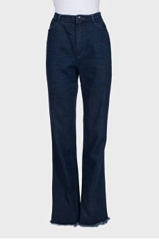 Wide leg fit jeans with raw hem