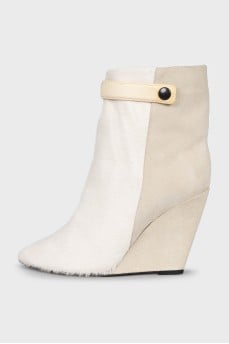 Suede ankle boots with a zipper and a wedge heel