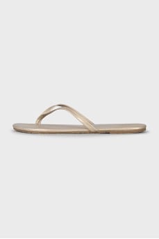 Golden leather flip flops