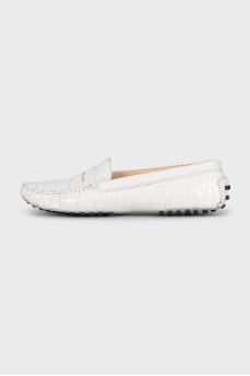 Leather moccasins with embossing