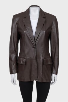 Leather jacket with a button