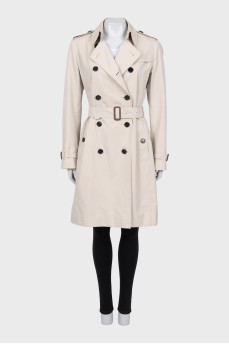 Double-breasted trench coat with buckles