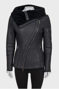 Black sheepskin coat with a high collar
