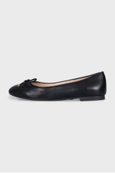 Black leather ballet flats with gold hardware