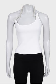 White top with metallic decor