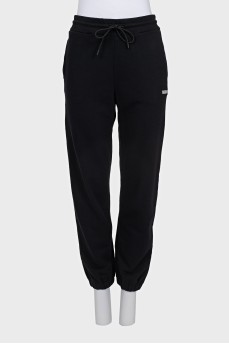 Sports pants with a white logo