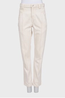Beige jeans with creases