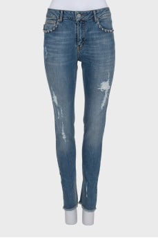 Рвані джинси skinny fit з шипами