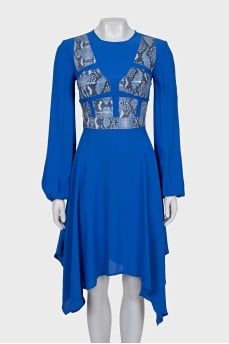 Dress with decorative elements and tag