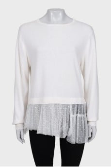 Jumper decorated with a transparent frill
