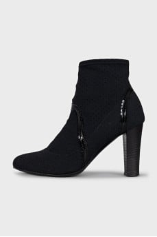Ankle boots with perforated heels