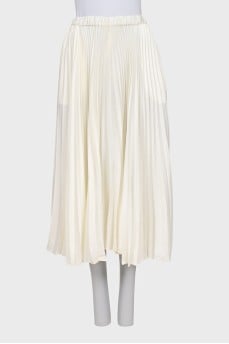 Pleated midi skirt with elastic waistband and tag