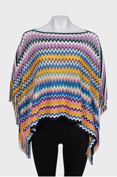 Multicolored cape with fringe