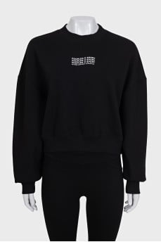 Black sweatshirt with a contrasting print