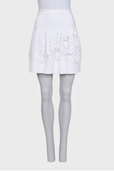 White skirt with perforations