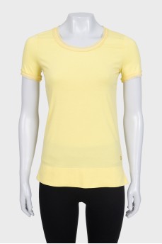 Yellow T-shirt with decoration