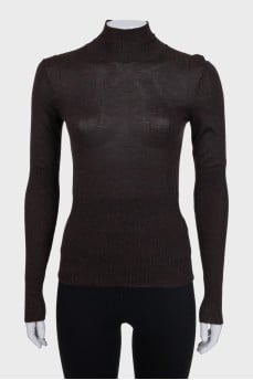 Brown jumper with a tie at the neck