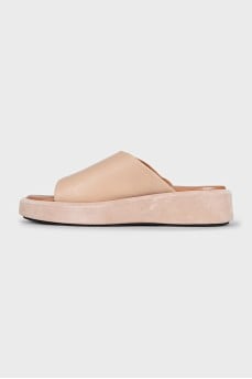 Beige leather flip-flops with high soles