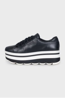 Leather sneakers with black and white soles