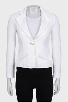 White fitted jacket with a button