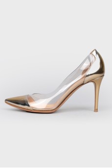 Golden shoes with transparent inserts