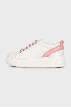 White leather sneakers with pink inserts
