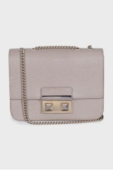 Leather crossbody bag with chain