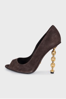 Brown shoes with a curved heel