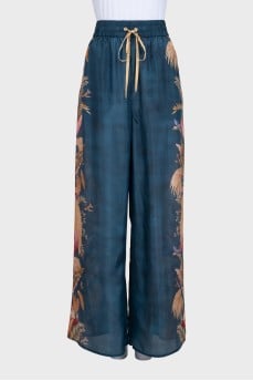 Silk trousers with print and tag