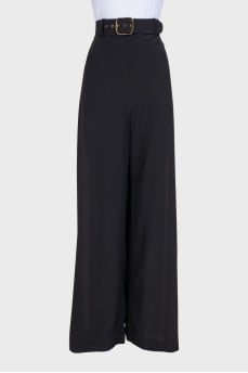 Black wide-leg trousers with tag