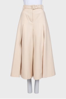 Beige wide-leg trousers with tag