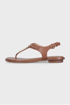 Brown sandals with gold studs
