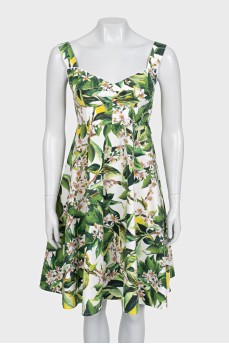 Fitted sundress with a green print