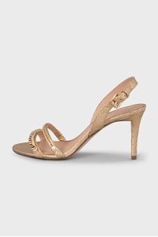 Gold-colored heeled sandals