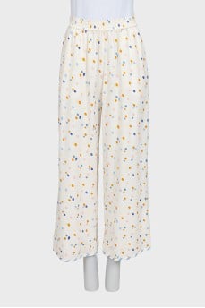Wide trousers with a multi-colored print