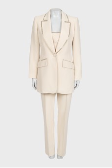 Beige suit with trousers, top and jacket
