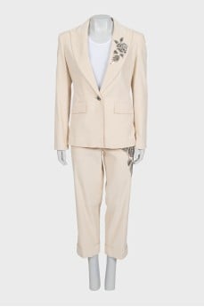 Beige suit with beaded embroidery