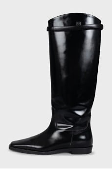 Black leather boots with decorative elements