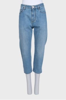 Blue jeans with logo and rhinestones