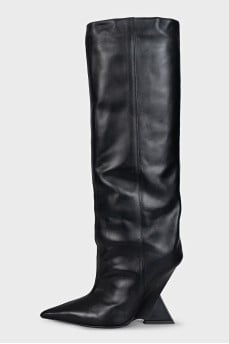 Black leather boots with a shaped heel