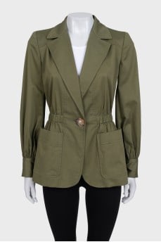 Green fitted jacket with a button