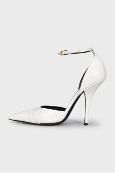 White shoes with a signature logo